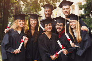 Group of students taking photo on graduation day