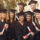 Group of students taking photo on graduation day